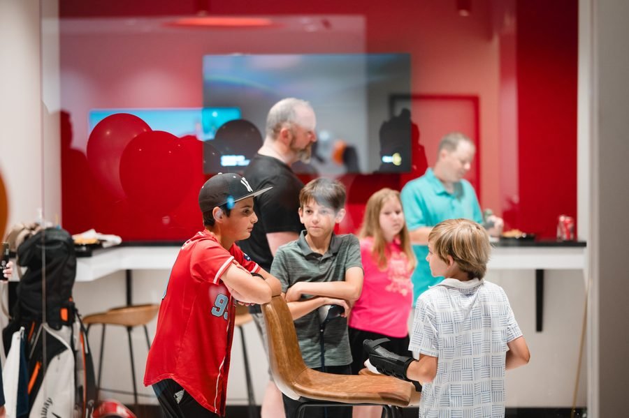 Guests gathered in the Birdie Central lounge during a party